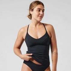 New With Tags Athleta Triangle Tankini Top Black Fits Sizes A To C Tag Says Size S P Tag Says: Fitted Next To The Body Adjustable Tie Back For Custom Fit And Styling Light Support With A Low Coverage Neckline Note: Purchased At The Distribution Center And Was A Non-Returnable Item, So There Is A Line On The Tag Athleisure Tops With Built-in Bra For Training, Black Tank Top With Built-in Bra For Workout, Black Workout Tank Top With Built-in Bra, Sporty Racerback Tankini With Built-in Bra, Black Seamless Tank Top For Athleisure, Athleisure Sleeveless Swimwear For Workout, Black Tops With Built-in Bra For Training, Sports Tankini With Built-in Bra And Stretch, Sporty Tops With Built-in Bra For Sports