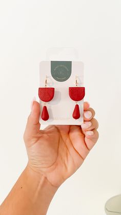 This pair has been handcrafted out of polymer clay, which means they are super light weight, comfortable and perfect for the holidays as the perfect element of your wardrobe or as a unique present. All of our pieces are assembled in gold plated hoops or studs, which makes them perfect for sensitive ears. All of our earrings are handmade with love and care in small batches.  Please note, every piece is made with unique mixed colors, baked, sanded and finished by myself, so light variations in siz Christmas Clay Earrings, Christmas Clay, Holiday Earrings, Earrings Christmas, Holiday Earring, Red Clay, Unique Presents, Earrings Drop, Mixed Colors