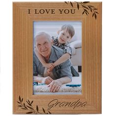 PRICES MAY VARY. Picture Frame Measures: 6 1/2" x 8 1/2" and holds a 4" x 6" photo. Complete with glass front. Made from Top-quality wood, this frame will have its own unique color and wood grain pattern. This frame may vary slightly in the color and grain pattern as it is made from 100% natural wood. Laser Engraved not printed. Ideal to display your memories with grandma, grandpa, mom, grandchildren, grandparent, family and friends. Included is a Back-stand easel for table display and wall-hang Best Grandpa, Wood Grain Pattern, Grandfather Gifts, Modern And Traditional Decor, Wood Photo Frame, Wood Photo, Portrait Frame, Table Display, Grandparents Day