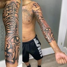 a man with his arm covered in tattoos