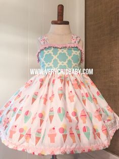 a dress on a mannequin with an ice cream pattern