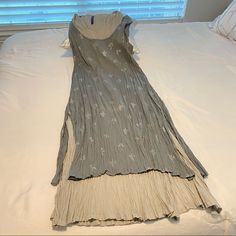 Reposhing This Item I Purchased From @Trendsbyblaze. Sadly It Didn’t Fit Me. Runs More To A Size M/L. Underdress Is Gray/Beige In Color And Over Tunic Is A Soft Gray With A Metallic Silver Print. Size Xl. This Is A Dress You Can Slip Into, Ad Some Strappy Sandals, Statement Earrings, A Few Bangles And You Are Ready For Date Night, Movie, Party Etc. Going On Vacation? This Is A Perfect Vacation Dress! Questions? Leave A Comment Below! Casual Silver Spring Dress, Layered Tunic, Miniature Dress, Vacation Dresses, Strappy Sandals, Xl Dress, Date Night, Statement Earrings, Metallic Silver