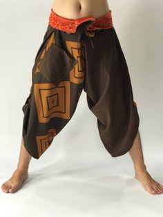 "These special design harem pants have fisherman pants style wrap around waist and belt, totally unlike anything before them. The main fabric is made from pre-washed soft cotton with a subtle texture. The fold-over waist is made from vintage handmade fabric brought from hill tribes in northern Thailand, so they are totally unique. There is one side pocket for your essentials. The hem has matching pull-up tabs for added personality. These performance pants are designed for extreme mobility, perfe Yoga Harem Pants, Samurai Pants, Handmade Pants, Genie Pants, Fisherman Pants, Boho Pants, Rayon Pants, Gorgeous Dresses, Fashion Pants