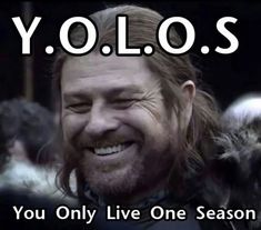 a man with long hair and beards smiling in front of a black background that says yolo's you only live one season