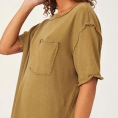 This Tee By We The Free From Free People Features A Crew Neck, Short Sleeves, Patch Breast Pocket, Raw Rolled Edges, Raised Seams, And A Deconstructed Feel. Color: Rosemary Tea Size: Large Brand New With Tags Same Or Next Day Shipping Shell: 50% Cotton, 50% Recycled Cotton Short Sleeve T-shirt With Frayed Hem For Loungewear, Relaxed Cotton Tops With Frayed Hem, Relaxed Crew Neck Top With Frayed Hem, Relaxed Short Sleeve Tops With Frayed Hem, Short Sleeve Tops With Frayed Hem For Loungewear, Relaxed Fit Tops With Frayed Hem For Loungewear, Khaki Cotton Top For Loungewear, Khaki Relaxed Fit Crew Neck Top, Khaki Relaxed Fit Tops For Everyday