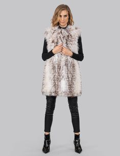 Fantastic vest with a combination of fox fur to the front and rabbit to the back, in white and brown color. A magnificent piece for dynamic women with aesthetic, like you! Can be worn alone during the spring months or with your leather jacket on the cold winter months, and make you stand out with your incredible style, in every kind of appearance. An outerwear of exquisite quality and high aesthetics that will make you stand out. Fox and rabbit fur vest Fur vest with eye hook closure Front closu Mink Sleeveless Winter Vest, Sleeveless Faux Fur Coat, Fur Lined Vest, Sleeveless Faux Fur Coat With Fur Trim, Sleeveless Fur Coat With Faux Fur Trim, Faux Fur Lined Vest, Fluffy Vest, White Faux Fur Vest, Fur Vest Women