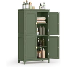 a green cabinet with several bottles and soaps on it's shelves next to other bathroom items