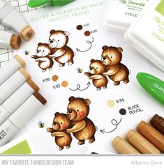 some brown bears stickers and markers on a table