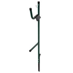 a green metal pole with two hooks on it