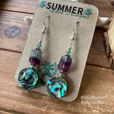 Abalone earrings shell jewelry flourite gemstone silver bohemian beach purple earrings dangle boho crystal unique jewelry earrings for women Drop length: 1.5 inches These beach beauties have 14mm abalone shell beads, 12mm fluorite gemstone beads, 4mm Swarovski crystal beads, silver plated findings and ear wires. Unique boho earrings from SLDbeadwork. Earrings for women. Yes, please. I love to rock a great pair of earrings. Stone, crystal, lampwork, beaded earrings, well I love all of them Can't Purple Bohemian Jewelry For Summer, Purple Earrings For Summer Beach, Purple Dangle Jewelry For Beach, Handmade Purple Beach Jewelry, Purple Drop Earrings For The Beach, Purple Bohemian Earrings For Beach, Purple Drop Earrings For Beach, Purple Dangle Earrings For The Beach, Purple Dangle Earrings For Beach