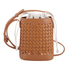 a brown leather bag with white draws on the front and shoulder strap, in an open weave pattern