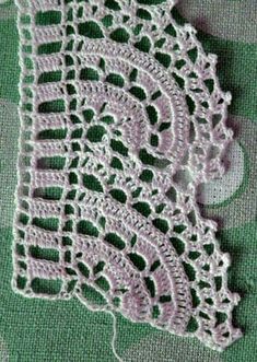 a close up of a piece of cloth with crochet on it