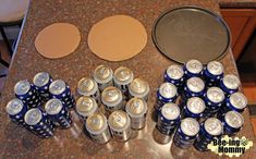 there are many cans of beer on the table