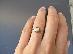 "Amazing and rare Victorian era baby milk tooth ring in 14k rose gold. This ring centers around a baby tooth. Infant mortality in Victorian times was close to 50% so having a child that survived long enough to lose their baby teeth was a milestone to be celebrated. Families of means would have these pieces of jewelry made. Every single one is different that I've ever seen. Very good antique condition; you can see some glue at the base of the tooth (may have been a repair at some point). The toot Baby Teeth Jewelry, Tooth Ring, Infant Mortality, Victorian Times, Teeth Jewelry, South Pasadena, Gold Teeth, Baby Milk, Baby Teeth