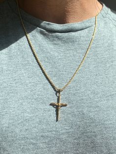 "18kt Gold Filled Crucifix Jesus Necklace - Unisex Chain Length: Options available. Chains can vary by .5\". Model is wearing a 18\" Material: 18 Karat Gold Filled, Hypoallergenic. Tarnish Resistant. Gold-filled does not de-laminate or peel like Gold plated Jewelry nor does it tarnish as readily as silver. Generally speaking, gold filled is better quality and will have a much longer lasting color than plated jewelry. We recommend keeping abrasive chemicals away from the jewelry for the items to 14k Gold Spiritual Cross Necklace, Spiritual Yellow Gold Cross Necklace, Traditional Gold Crucifix Jewelry, Spiritual Yellow Gold Jewelry With Rope Chain, Yellow Gold Cross Pendant Jewelry With Rope Chain, Yellow Gold Rope Chain With Cross Pendant Jewelry, Yellow Gold Cross Pendant With Rope Chain, Gold Cross Rope Chain Jewelry, Gold Rope Chain Cross Jewelry