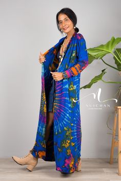 "Blue Tie Dye Cardigan Kimono, Hippie Duster Vest with pockets, Festival Wrap Cape, Beach cover up Produced by NUICHAN PRODUCT SIZE : One Size Fits Most These are the exact measurements from the dress, measured whilst laying flat >> * Chest : 32\" up to 40\" * Shoulder to Shoulder : 14 \" * Sleeve length from shoulder to hem : 21\" * Armhole : 16\" * Length : 48\" ( from shoulder to hem) NOTE : * Model chest : 32\", waist : 24\" hips : 35\" * Combined Height is 5\"6 > I'm 5\"2 (158cm) and I'm we Bohemian Multicolor Kimono For Beach Cover-up, Long Tie-dye Kimono For Summer, Bohemian Multicolor Kimono As Beach Cover-up, Duster Vest, Cardigan Kimono, Festival Tie-dye Kimono, Tie Dye Cardigan, Long Tie-dye Bohemian Kimono, Tie And Dye