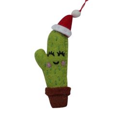 a green cactus with a red santa hat on it's head is hanging from a string