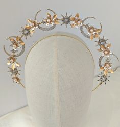 A stunning, unique celestial halo headpiece.  Large Gold crystal crescent moons are the main event for this halo crown, alongside champagne and rose gold florals and finished with Swarovski pearls. *DETAILS*  * All of my designs are handcrafted by myself in my small bridal boutique and made to order.  * Set onto a comfortable but sturdy headband.  * Diameter 6cm at it's highest point  * Can also be made in silver tone.  * Your halo will arrive safely packaged in a luxury dust bag for future stor Small Bridal Boutique, Champagne And Rose Gold, Bridal Crown Crystal, Halo Headpiece, Galaxy Hair, Crown Crystal, Halo Crown, Delicate Clothes, Wedding Headdress