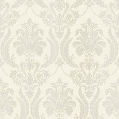 a white wallpaper with an ornate design