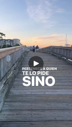 a wooden bridge with the words, perfect place to be in teno pride sino