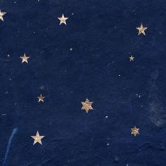 gold stars on a dark blue background