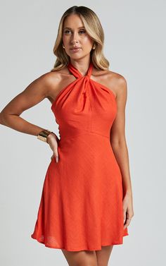 Get ready to turn heads in the Louie Mini Dress - Linen Look Halter Neck Dress In Orange! This vibrant orange dress is perfect for any casual occasion. The A-line silhouette flatters your figure, while the halter neck adds a touch of elegance. Made from soft and breathable viscose fabric, this sleeveless dress will keep you cool and comfortable all day long. Whether you're heading out for brunch or a night on the town, this mini dress is sure to make a statement. Embrace your unique style and fe Orange Halter Dress, Halter Homecoming Dress, Casual Wedding Guest Dresses, Basic Black Dress, Bachelorette Dress, Neon Outfits, Spring Maxi Dress, Feel Empowered, Halter Neck Dress