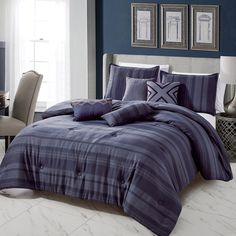 a bed in a room with blue walls and white flooring on the carpeted floor