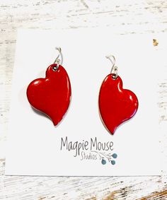 Heart Earrings ~ Red Enamel Minimalist Asymmetrical Heart Drop Earrings by MagpieMouseStudios on Etsy https://www.etsy.com/listing/750341562/heart-earrings-red-enamel-minimalist Red Everyday Earrings, Valentine's Day Heart Charm Enamel Earrings, Enamel Heart Charm Earrings As Gift, Heart Charm Enamel Earrings, Handmade Heart-shaped Enamel Earrings, Heart-shaped Enamel Earrings With Charm, Enamel Earrings With Heart Charm As Gift, Valentine's Day Enamel Dangle Earrings, Valentine's Day Gift Enamel Earrings