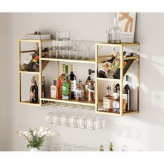 a shelf filled with lots of bottles and glasses