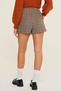 The plaid skort brings together the best of both worlds by blending the style of a skirt with the comfort and practicality of shorts. Its plaid pattern adds a touch of classic charm, making it a versatile piece for various outings. Whether you're looking for a chic yet functional choice for casual days or a stylish option for a more put-together look, the plaid skort has you covered. Style: Casual Print / Pattern: Plaid Silhouette: Skort Fit: Regular Embellishment: Side Pockets Neck Line: n/a Sl Plaid Skort, Cocoa Brown, Best Of Both Worlds, Grey Plaid, Charm Making, A Skirt, Brown Plaid, Plaid Shorts, The Chic