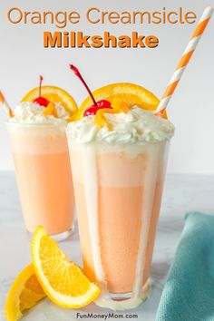 orange creamsice milkshake with whipped cream and fresh fruit on the side