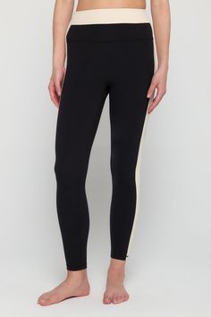 Meet your wear-everywhere leggings. Pair them with a cozy sweater, oversized tee, or with the cutest matching Aurora workout bra. Anyway you spin it, these sculpting, moisture-wicking wonders are the ready for the occasion. Squat-proof and lifting ready Ultra-flattering, sculpted compression Comfort-driven flatlock seams Breathable and moisture-wicking Contrasting colorblock design | Leighton Colorblock Legging in Black Fitted Activewear With Contrast Stripes For Workout, Stretch Activewear With Contrast Stripes For Sports, Black Activewear With Contrast Stripes For Workout, Fitted Gym Activewear With Contrast Panels, Black Stretch Activewear With Contrast Stripes, Stretch Color Block Sportswear Activewear, Color Block Stretch Sportswear Activewear, Sporty Compression Activewear With Color Block, Athleisure Activewear With Contrast Stripes For Sports