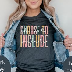 a woman wearing a t - shirt that says choose to include