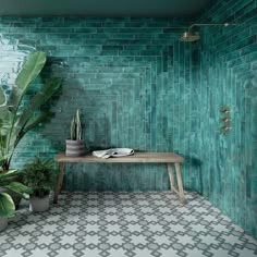 a green tiled room with a wooden table and potted plants on the floor next to it