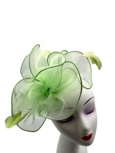 A Brand New light green Colour Fascinator With cloth fabric forming a beautiful layered flower with a burst of feathers, thus making a beautifully crafted fascinator. Made up of cloth fabric and feathers The length of the fascintor is approximately 20cm and its width at the widest point is 19cm. This Fascinator comes in with a light green colour headband and a metal clip as an attachment. These are removable and can be used according to your need. This allows you to wear the fascinator at differ Green Fascinator, Fascinator Hat, Royal Ascot, Garden Parties, Cloth Fabric, Fascinator Hats, Green Colour, Phone Screen, Other Colors