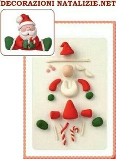 a christmas decoration with santa clause and candy canes on the bottom right corner is shown