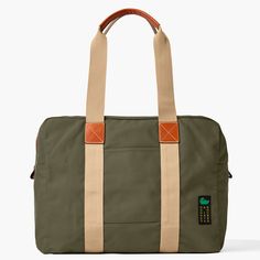 Travel in Style  With this travel-ready look, crafted from 100% Egyptian cotton canvas woven in Italy, you'll be able to pack for days at a time, so get ready to see the world in style. Khaki Canvas Travel Bag, Casual Travel Bag With Leather Trim For Overnight Trips, Casual Weekender Bag With Waxed Finish For Travel, Casual Waxed Finish Weekender Bag For Travel, Cotton Travel Bag With Canvas Lining For Overnight Trips, Brown Cotton Travel Bag, Casual Canvas Travel Bag With Leather Trim, Casual Waxed Canvas Travel Bag With Leather Trim, Casual Canvas Travel Bag With Luggage Sleeve