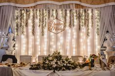 a table is set up with flowers and candles