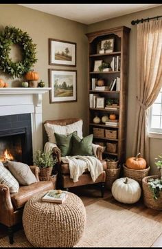 the living room is decorated with pumpkins and greenery, including an old - fashioned bookcase