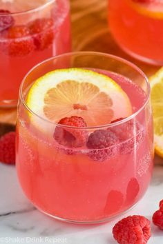 two glasses filled with raspberry lemonade punch