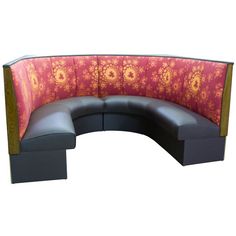 the corner couch is made out of wood and fabric