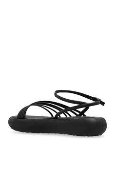 Black Travel platform sandals from Vic Matie. Fastened with an adjustable buckled ankle strap, this pair features decorative straps to the front and a black rubber sole. Composition: Outer Layer and inner Layer: 100% Leather Sole: 100% RubberComposition: 100% Vitello; Black Strap Sandals In Synthetic Material, Synthetic Ankle Strap Jelly Sandals With Buckle, Synthetic Ankle Strap Jelly Sandals With Buckle Closure, Synthetic Strap Sandals With Open Toe, Black Synthetic Strap Sandals, Black Strappy Slingback Sandals With Cushioned Footbed, Flat Synthetic Sandals With Adjustable Strap, Synthetic Ankle Strap Sport Sandals, Black Sandals With Adjustable Straps For Beach