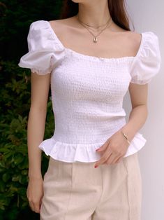 Short sleeve 100% cotton blouse with shirring, balloon sleeves with elastic cuff and ruffle hemline. Square neckline. Model is in MINUSEY ONE SIZE. * MINUSEY ONE SIZE = EU 34-38, US 2-6* 100% Cotton* Dry clean* Made in Korea - Model Height: 170cm/5'7" (US2, EU34) Shirred Blouse, Cotton Blouse, Square Necklines, Balloon Sleeves, Cotton Blouses, Square Neckline, Ruffle Hem, Peplum Top, White Dress