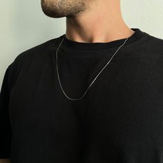 Elevate your style with our Thin Snake Chain Necklace, crafted from high-quality 925 Sterling Silver. This exquisite piece is available in two stunning finishes: Gold and Silver. With three versatile length options (50, 55, 60 cm), it's perfect for creating your unique look. Designed for both men and women, this unisex necklace adds a touch of sophistication to any outfit. Its slender and elegant appearance makes it a must-have accessory for everyone. Discover the perfect blend of style and qual Mens Silver Chain Necklace, Minimalist Necklaces, Gold Herringbone Chain, Herringbone Chain, Snake Chain Necklace, Silver Chain Style, Unisex Necklace, Everyday Necklace, Necklace Dainty