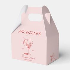 a pink carton with an image of a cocktail glass on it and the words michel's written in red