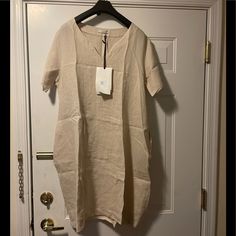 Baci Short Sleeve Linen Dress Casual Short Sleeve Unlined Dress, Beige Shift Midi Dress With Short Sleeves, Elegant Short Sleeve Tunic For The Beach, Elegant Short Sleeve Linen Dress For Vacation, Elegant Short Sleeve Beach Tunic, Linen Dress, Colorful Dresses, Midi Dress, Short Sleeves