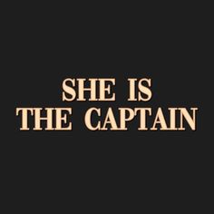 she is the captain text on a black background