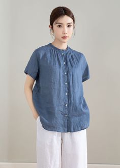 "Our blue linen shirt, loose, comfortable and versatile. It is practical enough to tuck into your favorite shirt, our blouse can also pair with skinny jeans, yes, it is a good choice for women tops.This shirt can be worn on both sides. Why Good selection with linen shirt? The main benefit of wearing linen clothes in hot weather is the coolness they provide. Linen is highly absorbent and a good conductor of heat. Your linen garment feels cool to the touch and linen fabric will quickly remove pers Linen Workwear Top, Solid Ramie Tops For Spring, Solid Linen Tops For Work, Solid Linen Top For Work, Casual Flax Tops For Spring, Casual Flax Cotton Blouse, Relaxed Fit Ramie Blouse For Daywear, Casual Flax-colored Cotton Blouse, Casual Short Sleeve Ramie Tops