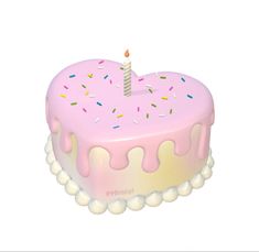 a pink birthday cake with sprinkles and a single candle