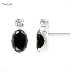 Description Radiate elegance with 14k solid gold black diamond studs, accented by sparkling diamonds. These two-stone earrings for her exude modern luxury, making them perfect for everyday wear or a bold evening statement. Trending in fine jewelry, they’re a must-have accessory this season. Product Details SKU CJ E 1159A BD Metal 14K solid gold Closing mechanism Push back Product dimension 12.76mm x 5.1 mm x 3.55 mm Birthstone April Certification - Black Diamond Details Stone size 7x5mm Quality Black Oval Earrings For Anniversary, Diamond Earrings Wedding, Black Diamond Studs, Minimal Earrings, Stone Studs, Sparkle Diamonds, Diamond Stone, Wedding Earrings, Stone Earrings